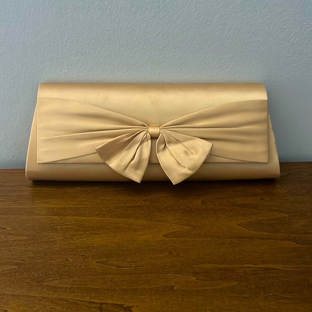 Gold clutch purse with bow